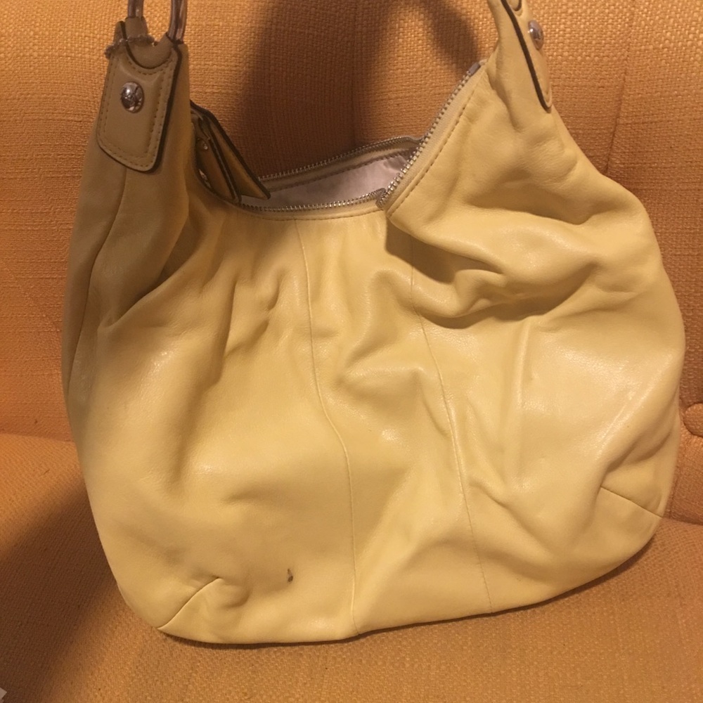 Soft yellow Coach bag